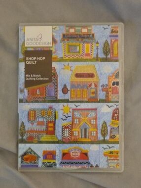 Anita Goodesign Shop Hop Quilt Pattern - Colorful Village Print